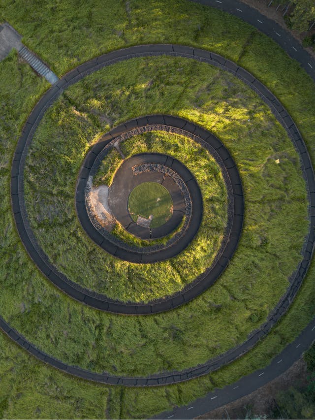 Aerial view of a spiral hilltop at Sydney Olympic Park